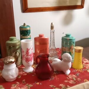 Avon vintage assortment of perfume and perfumed talc powder bottles.